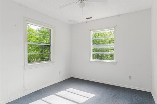 331 Hickerson St, Cedar Hill, TX 75104 - empty room featuring visible vents, a ceiling fan, carpet floors, and a healthy amount of sunlight