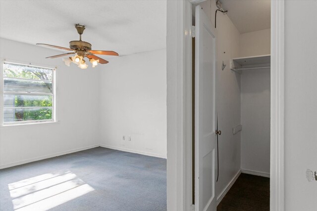331 Hickerson St, Cedar Hill, TX 75104 - unfurnished bedroom featuring a walk in closet, baseboards, a closet, and carpet flooring