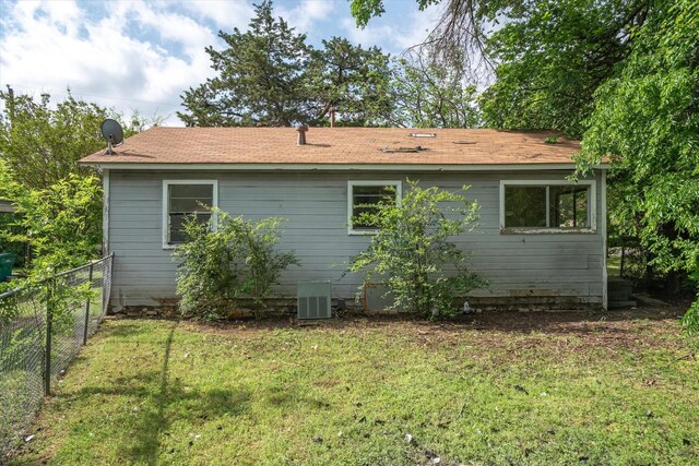 331 Hickerson St, Cedar Hill, TX 75104 - back of property featuring central AC, fence, and a yard