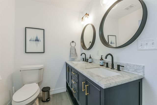 4110 Lou Anne Ln, Houston, TX 77092 - bathroom featuring toilet, double vanity, baseboards, and tile patterned floors