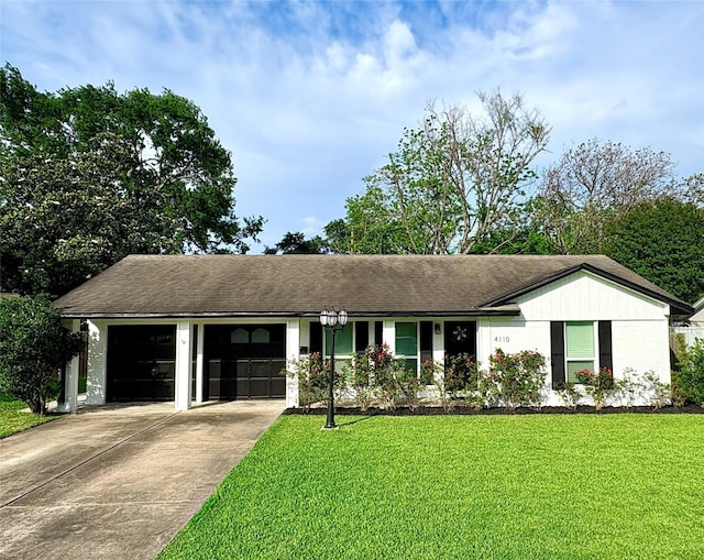 4110 Lou Anne Ln, Houston, TX 77092 - ranch-style house featuring an attached garage, concrete driveway, and a front yard