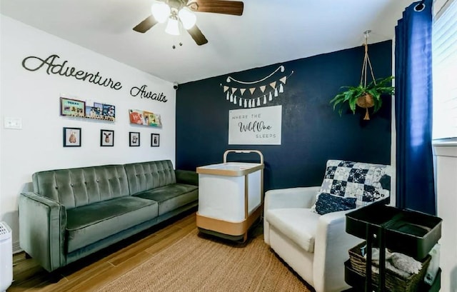 4110 Lou Anne Ln, Houston, TX 77092 - living area featuring ceiling fan and wood finished floors