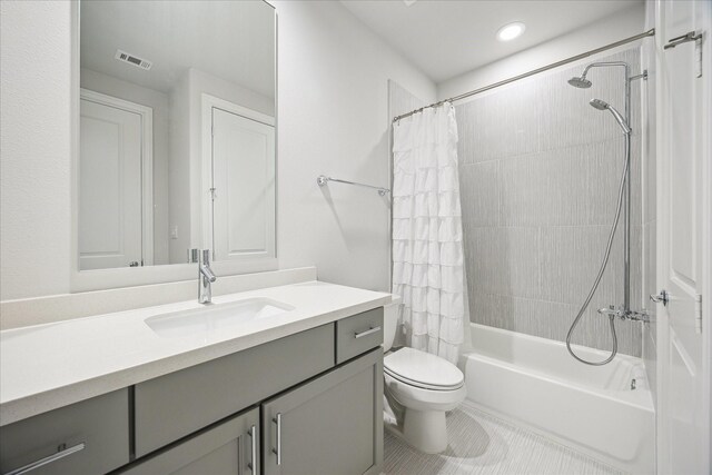 2421 W Kolbe Ln, Houston, TX 77080 - bathroom featuring visible vents, tile patterned flooring, vanity, toilet, and shower / bathtub combination with curtain