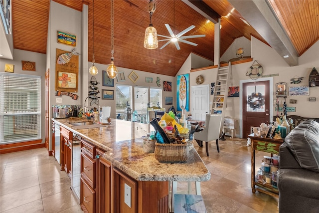 kitchen with brown cabinets, a sink, high vaulted ceiling, open floor plan, and wooden ceiling
