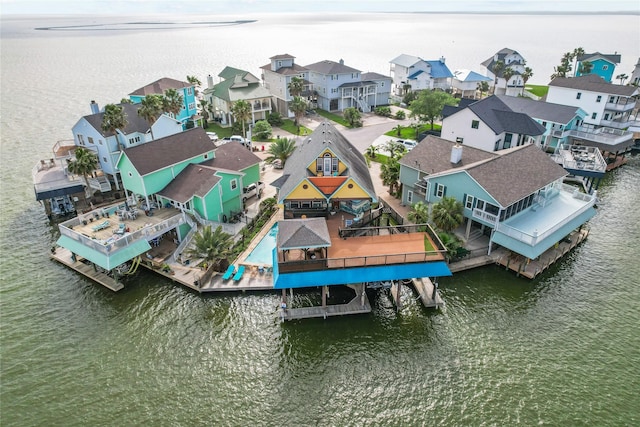 aerial view with a residential view and a water view