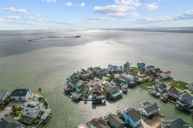 aerial view with a water view and a residential view