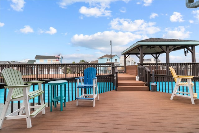 wooden deck with a gazebo