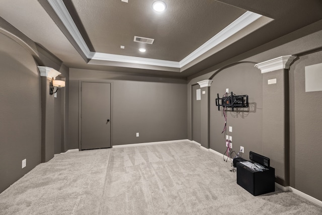 25211 Birchwood Springs Ave, Porter, TX 77365 - carpeted home theater featuring ornate columns, a tray ceiling, visible vents, and ornamental molding