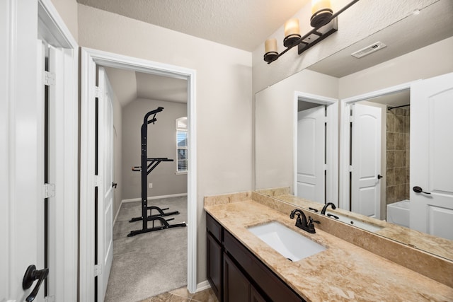 25211 Birchwood Springs Ave, Porter, TX 77365 - bathroom featuring vanity, visible vents, baseboards, walk in shower, and a bath