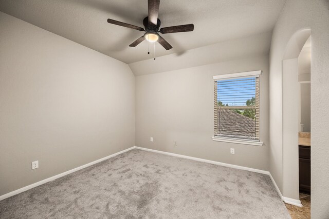 25211 Birchwood Springs Ave, Porter, TX 77365 - carpeted spare room featuring baseboards, a ceiling fan, and lofted ceiling