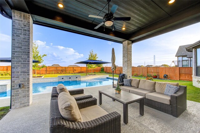 view of patio with ceiling fan, a fenced in pool, a fenced backyard, and an outdoor hangout area