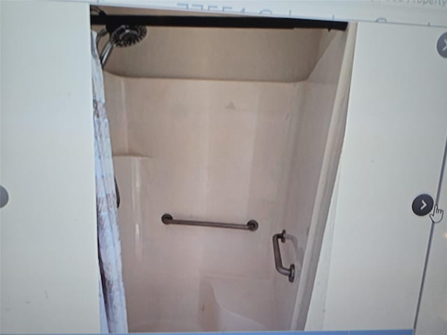 4222 Mason Dr, Galveston, TX 77554 - bathroom with a stall shower