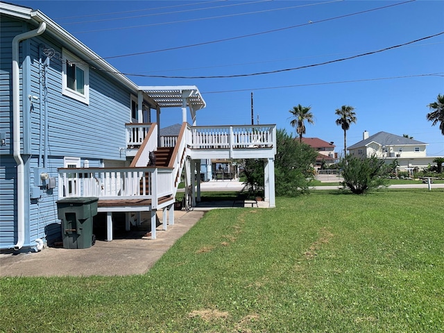 4222 Mason Dr, Galveston, TX 77554 - view of yard with a deck and stairs