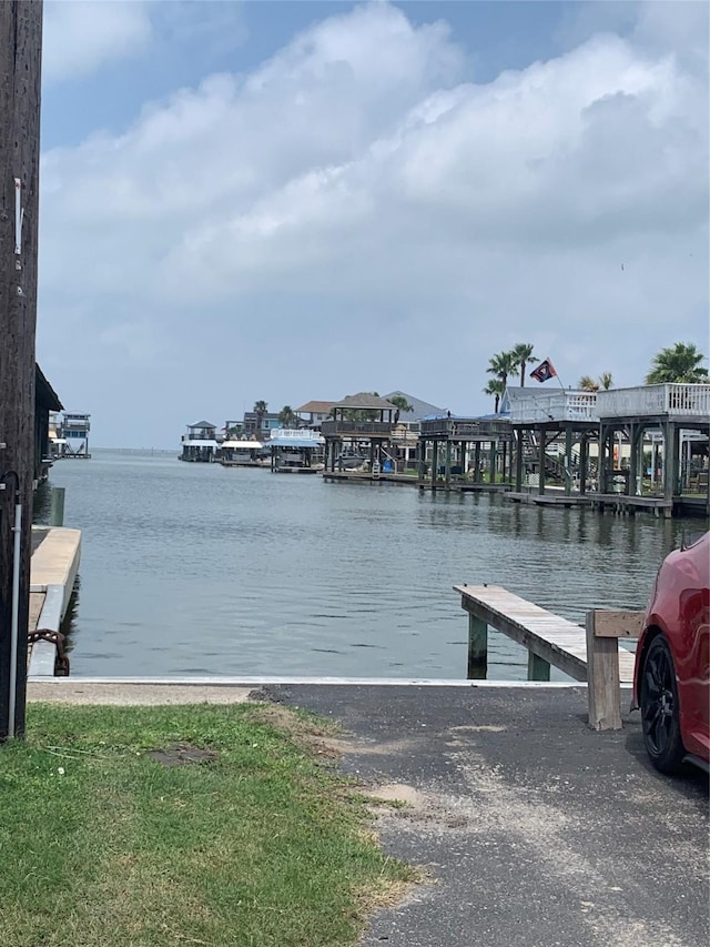 4222 Mason Dr, Galveston, TX 77554 - view of dock featuring a water view