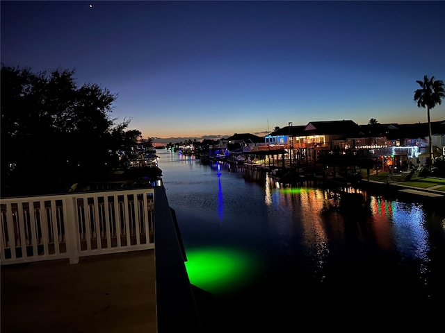 view of water feature with a dock