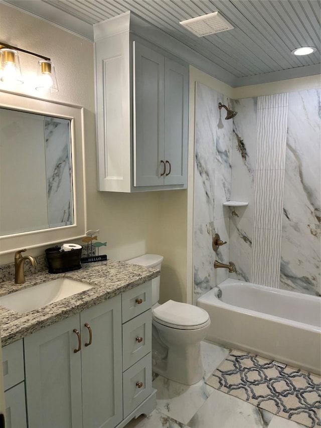 bathroom with visible vents, vanity, toilet, marble finish floor, and bathing tub / shower combination