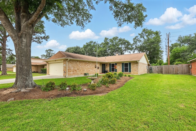 ranch-style home with brick siding, an attached garage, fence, and driveway