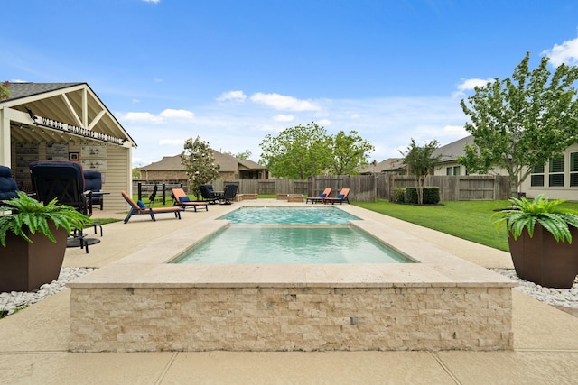 view of pool with a fenced in pool, a fenced backyard, a patio area, and a lawn