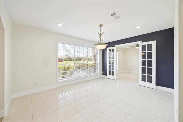 unfurnished dining area featuring recessed lighting, a ceiling fan, visible vents, and light tile patterned floors