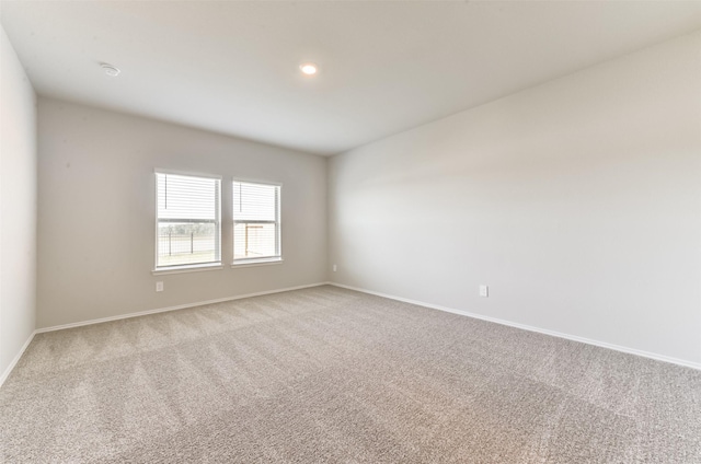 16524 Cascading Pines Ct, Conroe, TX 77302 - carpeted empty room featuring baseboards and recessed lighting
