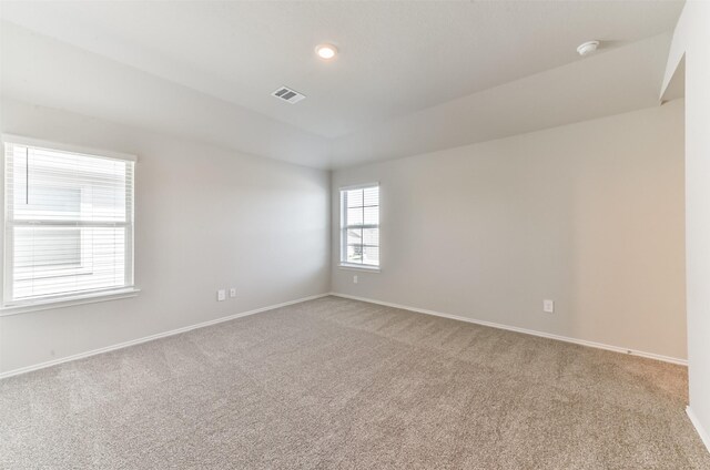 16524 Cascading Pines Ct, Conroe, TX 77302 - carpeted spare room featuring visible vents and baseboards