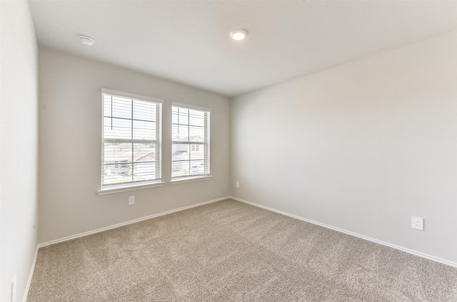 16524 Cascading Pines Ct, Conroe, TX 77302 - carpeted spare room featuring baseboards