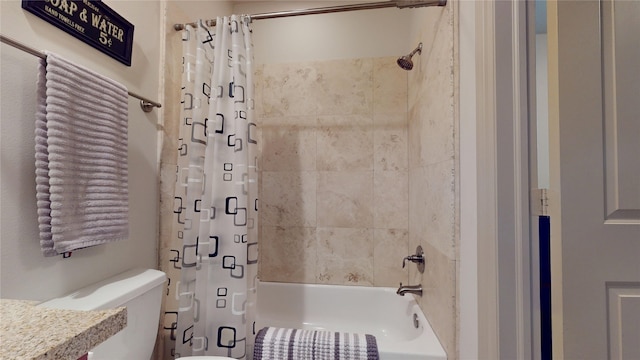 bathroom featuring shower / tub combo with curtain and toilet