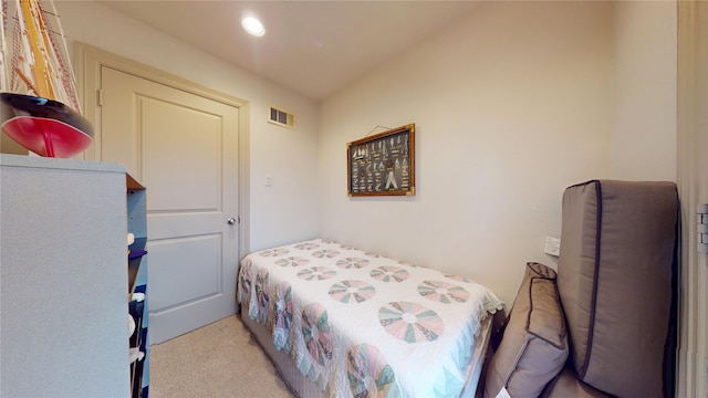 carpeted bedroom with recessed lighting and visible vents