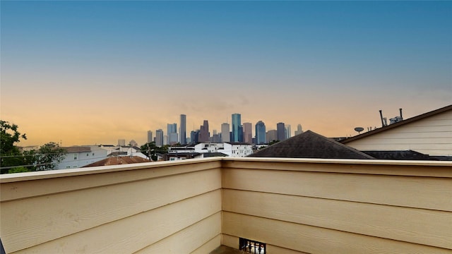 view of balcony at dusk