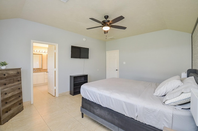 18235 Bonham Oaks Ct, Richmond, TX 77407 - bedroom with ensuite bathroom, a ceiling fan, light tile patterned floors, and lofted ceiling