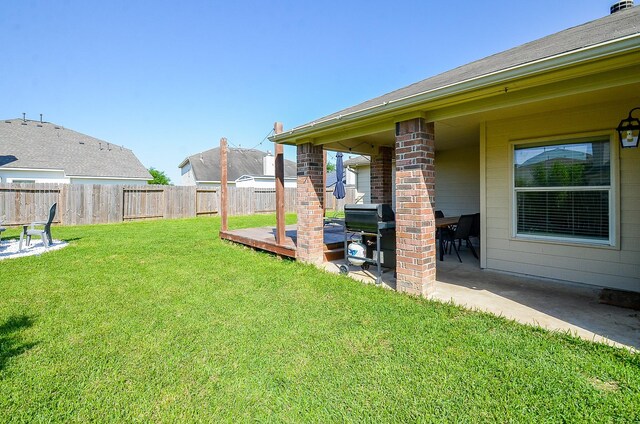 18235 Bonham Oaks Ct, Richmond, TX 77407 - view of yard with a patio and a fenced backyard