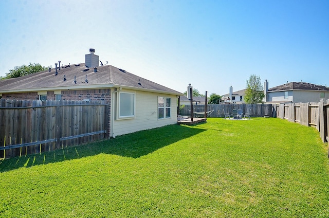 18235 Bonham Oaks Ct, Richmond, TX 77407 - view of yard with a fenced backyard and central AC unit