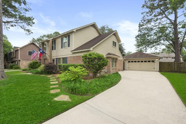 view of front of house featuring a garage, brick siding, fence, a front lawn, and a shingled roof