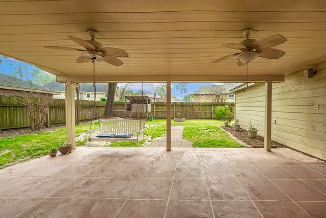 view of patio / terrace featuring a fenced backyard and a ceiling fan
