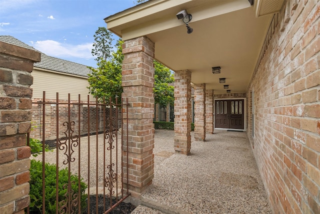 view of patio / terrace featuring fence