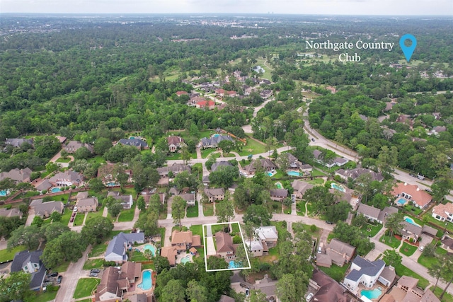 bird's eye view with a view of trees and a residential view