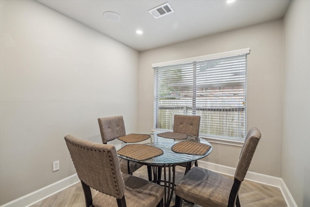 dining room with baseboards, recessed lighting, and visible vents