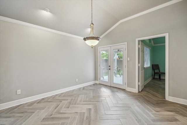 empty room featuring baseboards, ornamental molding, french doors, and lofted ceiling