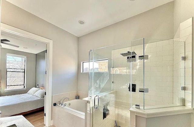 full bath featuring ensuite bathroom, a garden tub, a stall shower, and wood finished floors