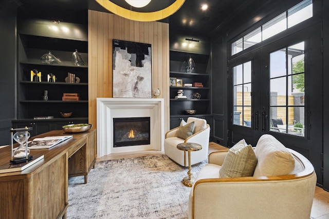 702 E 19th St, Houston, TX 77008 - sitting room with a glass covered fireplace, built in features, and french doors