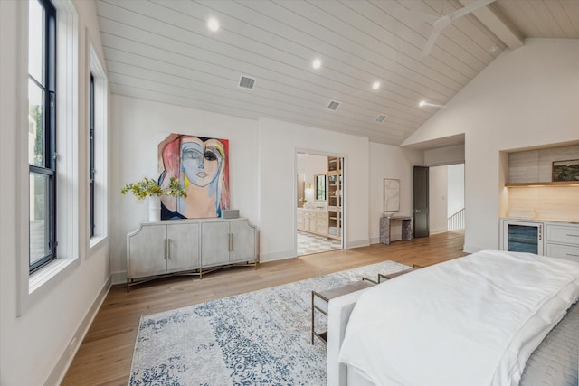 702 E 19th St, Houston, TX 77008 - bedroom featuring beverage cooler, multiple windows, light wood-type flooring, recessed lighting, and wood ceiling