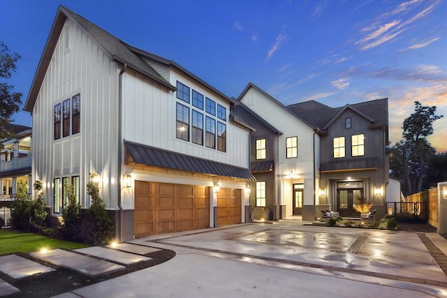 702 E 19th St, Houston, TX 77008 - modern farmhouse style home with a garage, board and batten siding, concrete driveway, and french doors