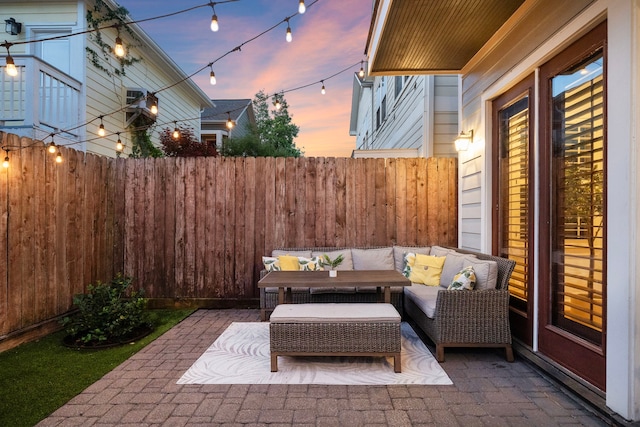 1538 Dorothy St, Houston, TX 77008 - patio terrace at dusk featuring fence and outdoor lounge area