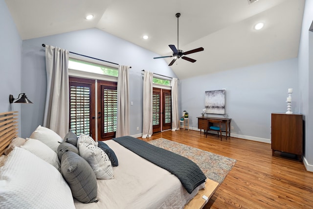 bedroom with ceiling fan, vaulted ceiling, wood finished floors, baseboards, and access to outside