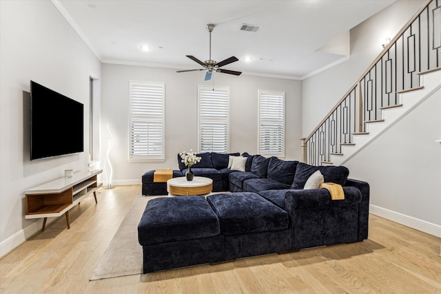 846 Dunleigh Meadows Ln, Houston, TX 77055 - living room featuring crown molding, baseboards, ceiling fan, stairway, and recessed lighting