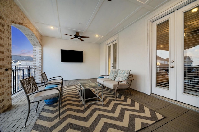 exterior space with ceiling fan and french doors