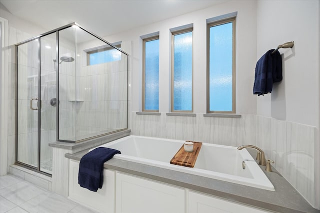846 Dunleigh Meadows Ln, Houston, TX 77055 - bathroom featuring a garden tub and a stall shower