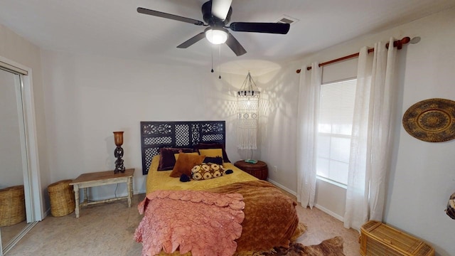 bedroom featuring baseboards and a ceiling fan