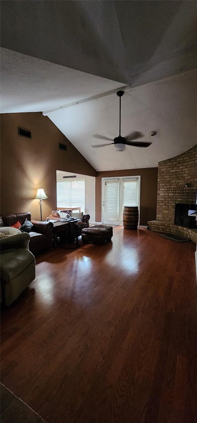532 S Rivershire Dr, Conroe, TX 77304 - living area featuring lofted ceiling, a ceiling fan, plenty of natural light, and wood finished floors