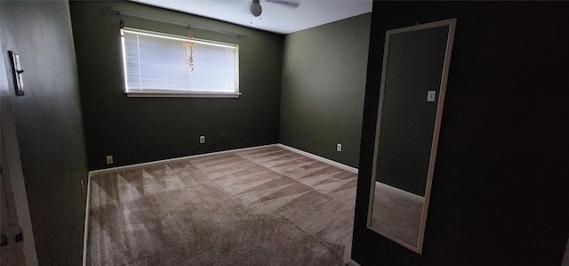 532 S Rivershire Dr, Conroe, TX 77304 - spare room featuring ceiling fan, carpet, and baseboards